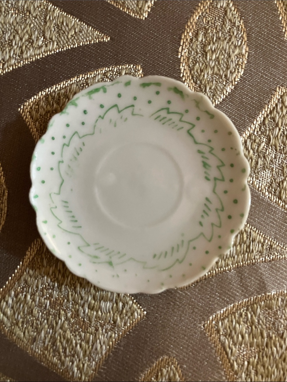 White Scalloped Ceramic Butter Pat with Hand-Painted Green Motif